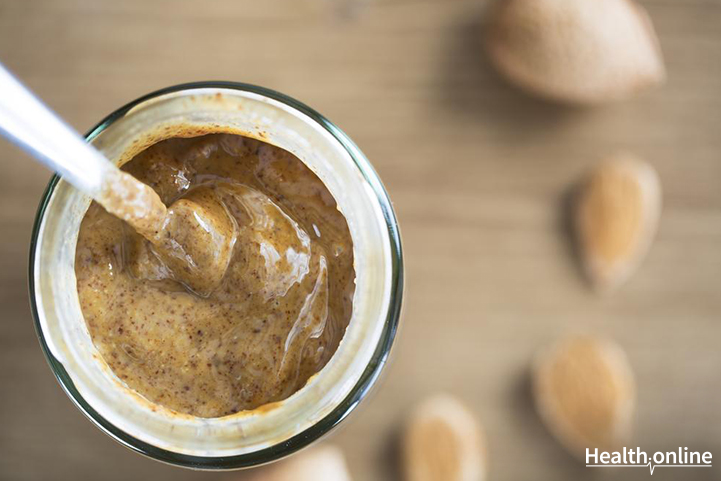 Seasonal fruits and almond butter spread